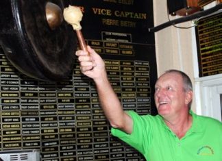 Bob Newell rings the bell after his fabulous golfing exploits at Green Valley.